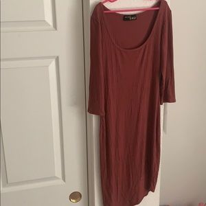 Rust colored body con dress with slit